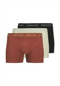 Drie paar boxershorts: een in roestkleur, een in crèmekleur en een in zwart. Elk heeft een zachte tailleband met "Originals studio" in wit gegraveerd.