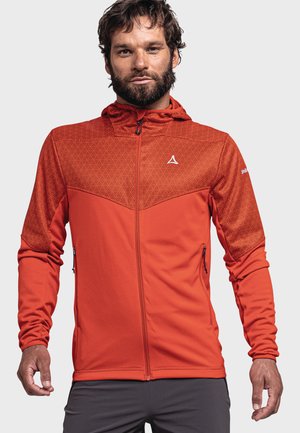 Red zip-up jacket with a textured geometric pattern on the shoulders. Features a hood, zippered side pockets, and elastic cuffs.