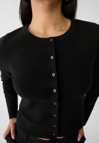Stradivarius Chaqueta de punto - black