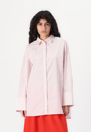 Striped button-up shirt in white with red vertical stripes, featuring a collared neckline and wide long sleeves.