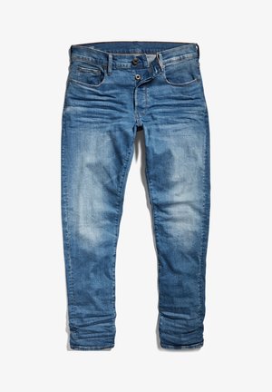 Jeans in denim blu con vestibilità slim, caratterizzati da chiusura con bottone e cerniera, cinque tasche e una leggera scoloritura su tutta la superficie.