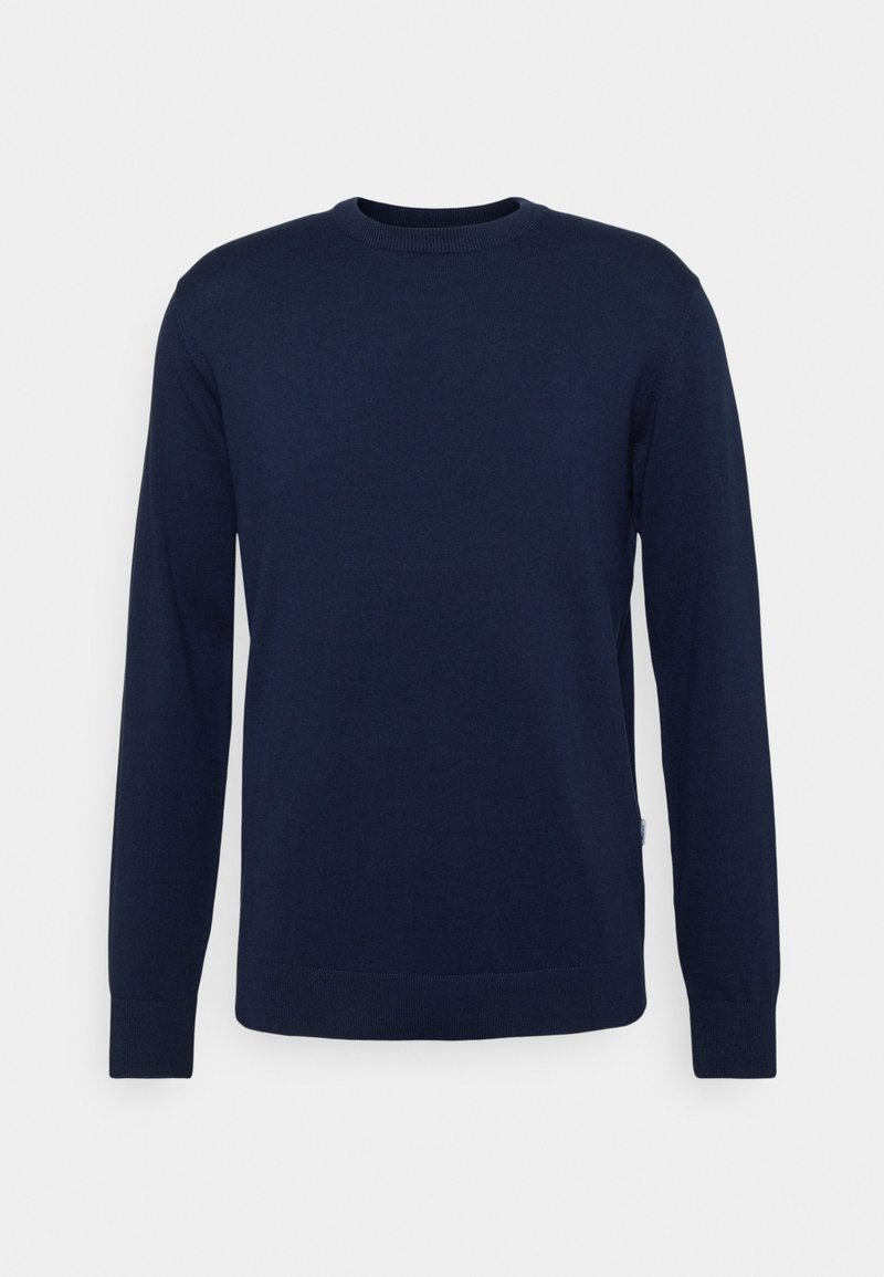 Suéter de punto azul marino con cuello redondo y mangas largas. Presenta puños y dobladillo de canalé, hecho de una tela suave y lisa. Sin patrones visibles.