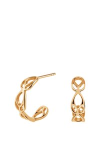 Złote kolczyki hoop z wyszukanym, wyciętym wzorem. Charakteryzują się gładkimi fakturami oraz lekką konstrukcją z wypolerowanym wykończeniem.