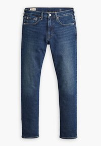 Mörkblå jeans i denim, med rak passform, fem fickor, kopparnitar och en subtil blekning på låren.