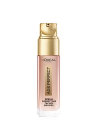 Sérum L'Oréal Age Perfect dans un flacon en verre transparent avec un bouchon pompe doré. Le flacon présente un dégradé de teinte rose et un texte noir.