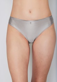 Silver satin bikini briefs with a smooth texture and subtle vertical stripes. Features a low waist and minimal coverage design.