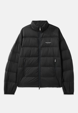 Black puffer jacket with quilted design, high collar, full front zipper, and two zippered pockets. Features logo on the left chest.
