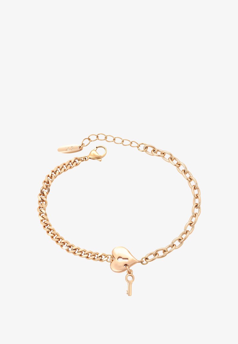 Arany lánc karkötő vegyes láncstílusokkal, szív alakú zárnal és egy kis kulcs charm-mal.