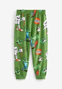 Pantalons de pyjama verts avec divers personnages de dessins animés et éléments, y compris des blocs de TNT, dans un motif répété avec des poignets côtelés.