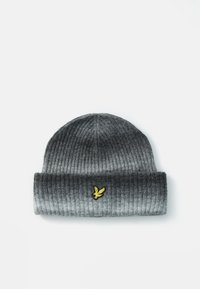 Gray ribbed knit beanie with a folded cuff, featuring a small yellow embroidered eagle logo on the front. Soft texture.