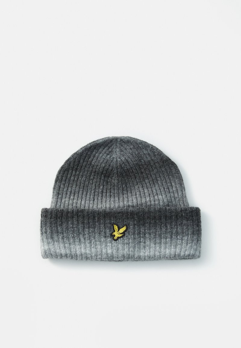 Gray ribbed knit beanie with a folded cuff, featuring a small yellow embroidered eagle logo on the front. Soft texture.