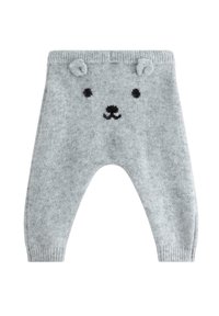 Grå strikkede toddlerbukser med et bjørneansigt design, der har ører, sorte ansigtstræk og ribbede manchetter ved anklerne og i taljen.