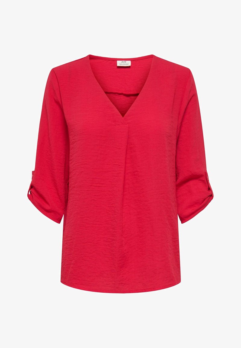 Czerwona bluzka z dekoltem w serek, rękawami podwiniętymi do długości trzy czwarte oraz teksturowaną tkaniną. Posiada luźny krój i prosty dół.