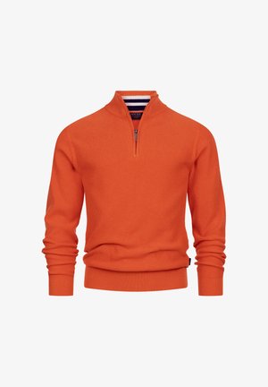 Narancssárga pulóver, negyedcipzárral, bordás textúrával és kontrasztos csíkozott béléssel a galléron. Testhezálló mandzsetták és alsó szegély.