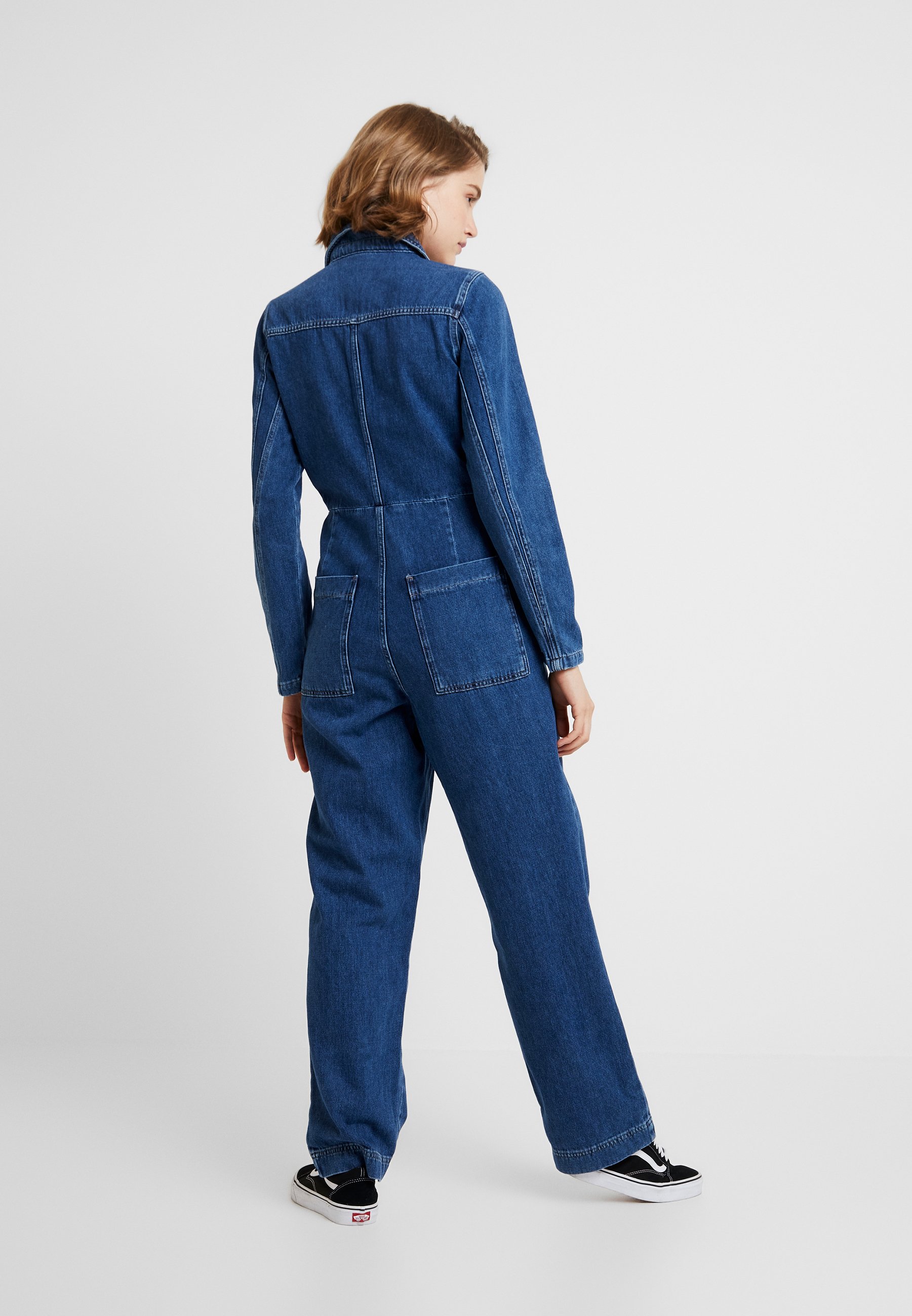urban outfitters jean jumpsuit