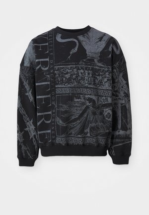 Black sweatshirt made of textured fabric, featuring gray graphic prints, ornate patterns, and bold text elements across the front and sleeves.