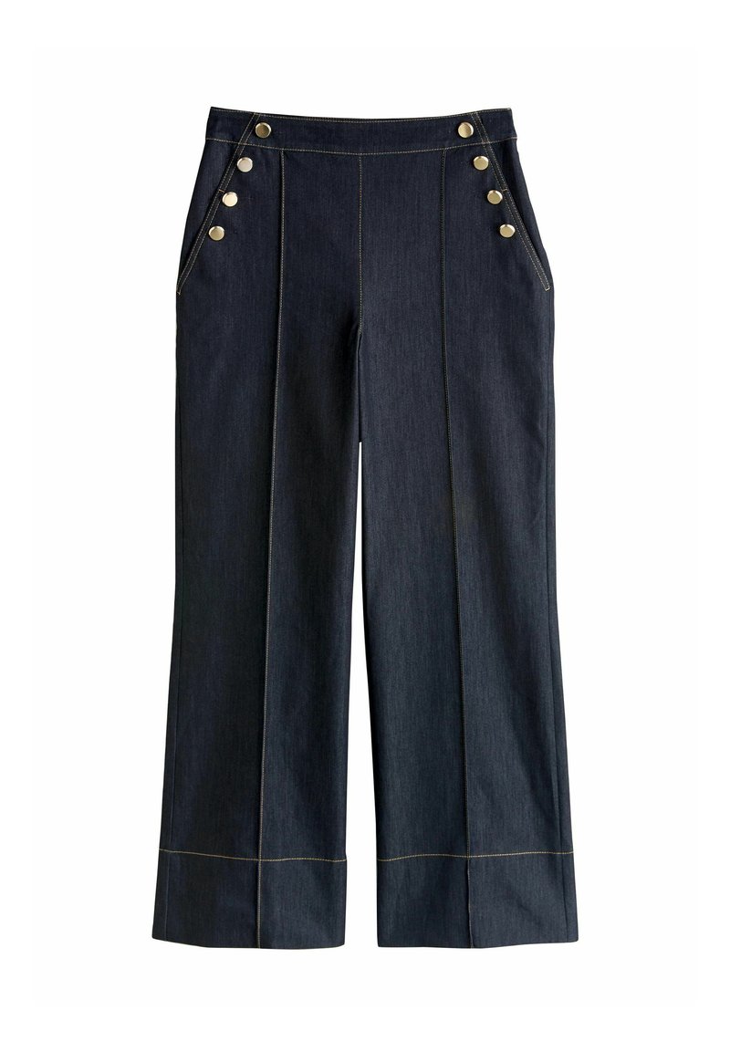 Donkere denim wijde pijpen broek met voorzakken, gouden knopen op de tailleband en contrasterende gele stiksels langs de naden.