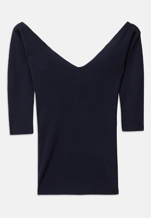 Top de punto acanalado navy con mangas largas y un escote en V profundo. La tela tiene un acabado texturizado que enfatiza su ajuste ceñido y diseño contemporáneo.