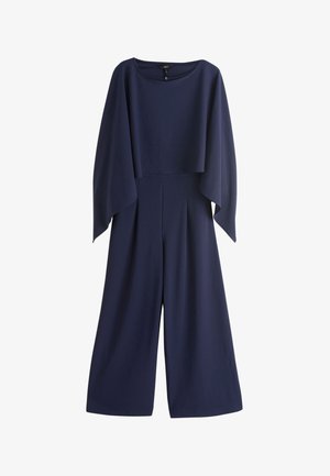 Combinaison bleu marine à jambes larges, manches longues évasées et col rond, avec fermeture à boutons au dos.