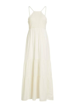 Vestido largo blanco sin mangas con corpiño de crochet, tirantes finos y falda fluida de capas sobre un fondo liso.