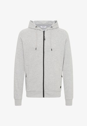 Light gray zip-up hoodie made of soft fabric. Features a hood, black zipper, and diagonal stitching accents. Includes side pockets with zippers.
