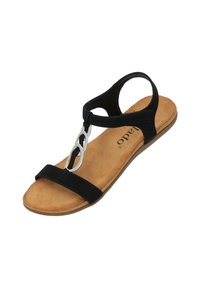 Sandal nero piatto con tomaia in suede, design a strappo per le dita e accentuazione centrale in hardware argentato. Sottopiede imbottito color nocciola per il massimo comfort.