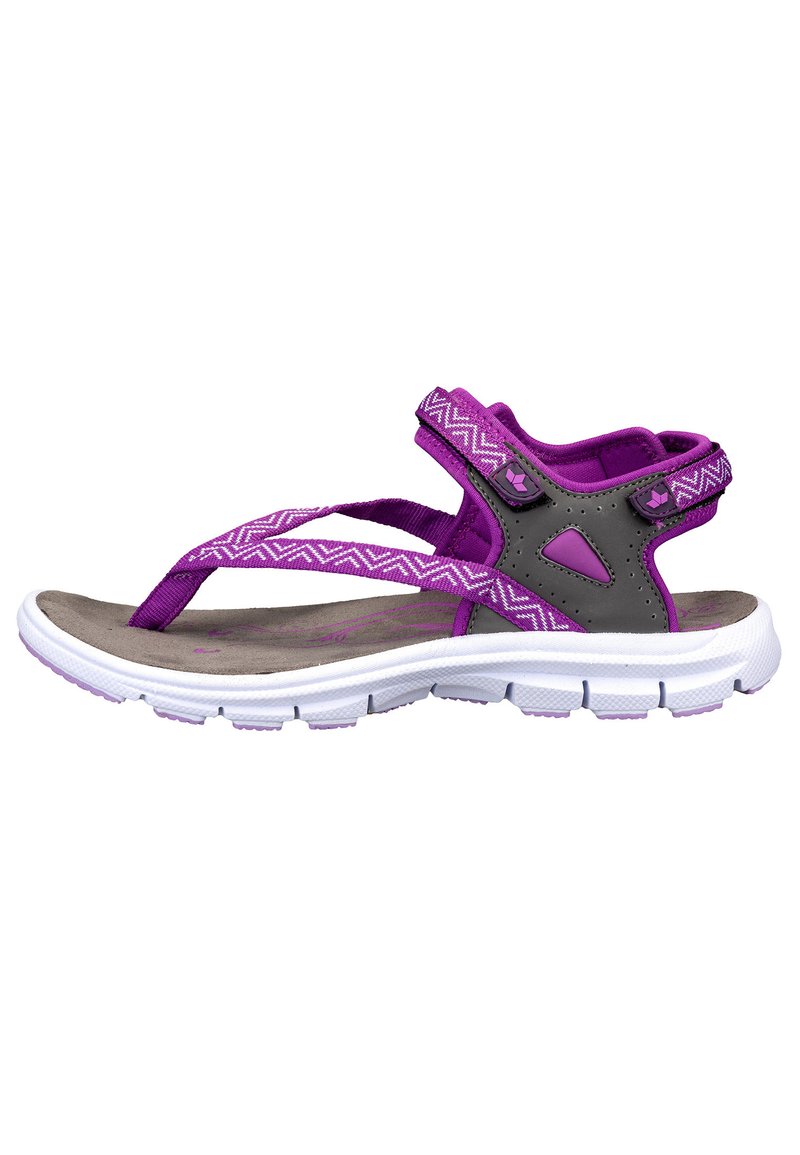 Purple sandals featuring a textile upper with zigzag patterns, a grey heel support, and a textured, cushioned footbed with a white sole.