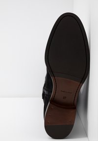 Alpe Botas mosqueteras - black