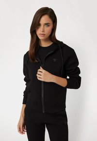 Guess DREIECKLOGO - Felpa con zip - schwarz