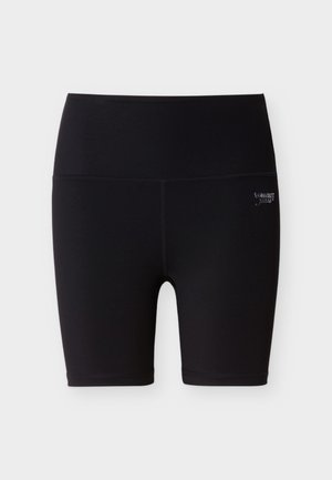 Pantalones cortos deportivos negros hechos de tela elástica. Cuentan con una cintura ancha y costuras planas para mayor comodidad. Incluyen un pequeño detalle de logo.