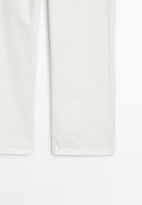 Light-colored cotton pants with a straight cut, featuring a smooth texture and single stitching at the hem. No visible patterns or accents.