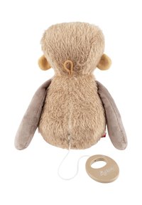 Soft, beige plush monkey with a zipper back, dark beige arms, and a round beige pull tag. Textured fur and a gold accent loop on the back.