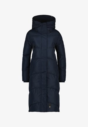 Cappotto puffa blu navy con cappuccio, caratterizzato da un design lungo, una texture trapuntata e due tasche laterali. Chiuso con bottoni e cerniere.