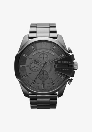 Orologio da polso cronografo Diesel nero con cinturino in metallo, tre sottoquadranti, visualizzazione della data e slogan "Only The Brave" sul quadrante.