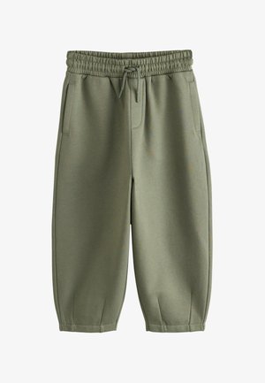 Olivgrüne kurze Hosen mit elastischem Bund und Kordelzug, zwei seitlichen Taschen und weiten Beinen, die oberhalb der Knöchel enden.