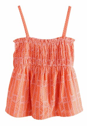 Orange sleeveless top with smocked bodice and adjustable straps. Features a patterned texture with subtle lace accents and a flared shape.
