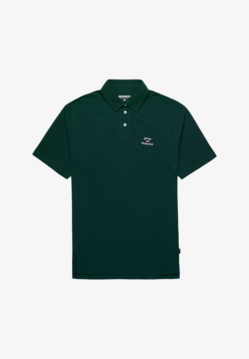 Polo shirt verde scuro in cotone; presenta un colletto, maniche corte e un piccolo logo ricamato sul petto. Design classico con una texture liscia.