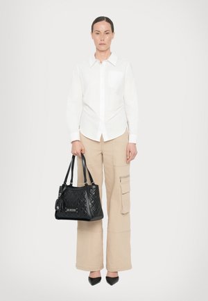 QUILTED BAG - Handbag - black