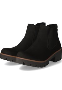 Stivaletti neri in suede con pannelli elastici laterali, suola in gomma texturizzata e plateau marrone. Presentano una punta tondeggiante e cuciture minime.