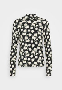 Långärmad topp i sträckt tyg med svart bakgrund. Tryckt med vita tusenskönor, gröna stjälkar och gula centra. Hög halsdesign.