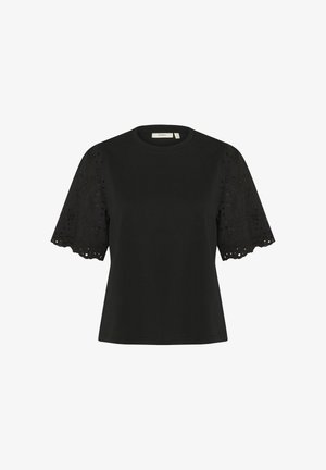 T-shirt noir à manches courtes en dentelle brodée et col rond. Le corps est en tissu lisse, tandis que les manches ont un bord en forme de vagues.