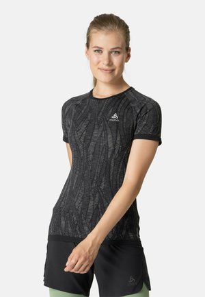 Black short-sleeve athletic shirt with textured leaf pattern, round neckline, and logo detail. Paired with black shorts.