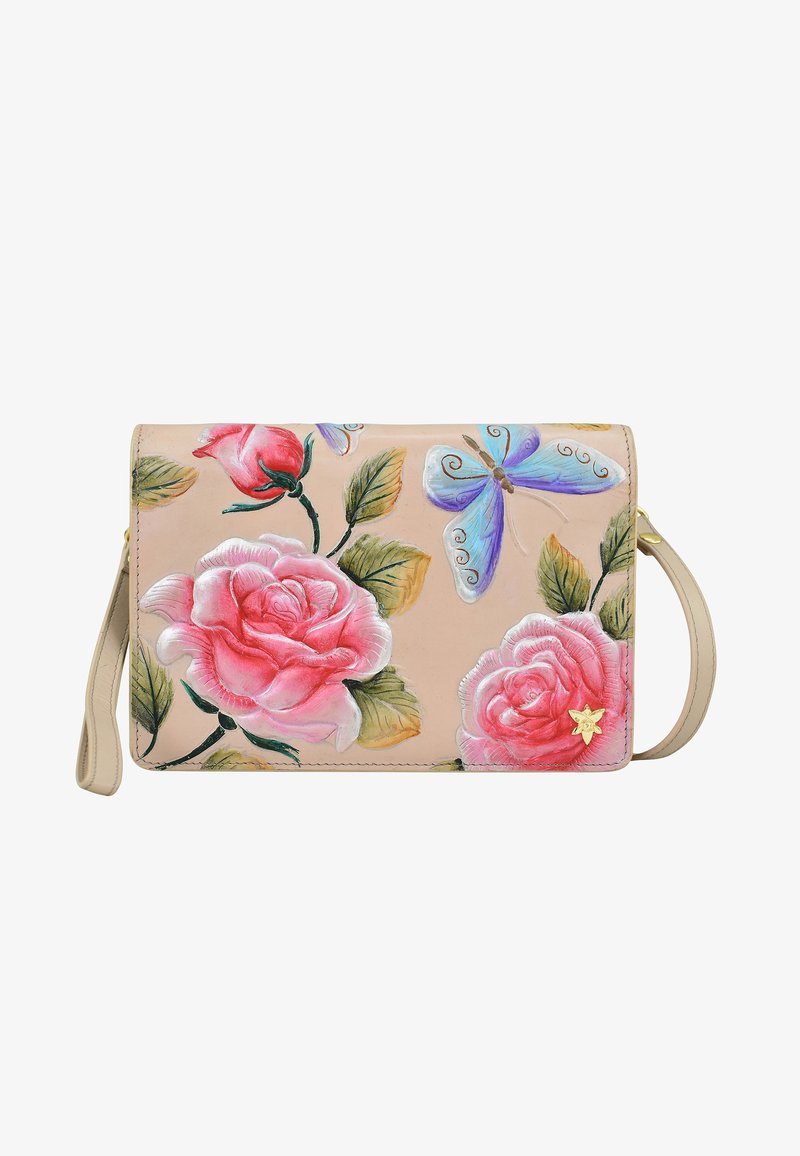 Blumen-Crossbody-Tasche mit pinken Rosen und einem blauen Schmetterlingsdesign auf beigem Hintergrund; verfügt über einen goldenen Stern-Akzent und einen abnehmbaren Riemen.