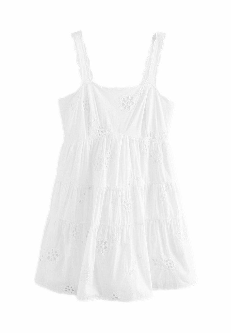 Robe blanche sans manches avec de délicates broderies florales et un tissu à étages. Matériau léger, présentant une silhouette fluide et des bretelles festonnées.