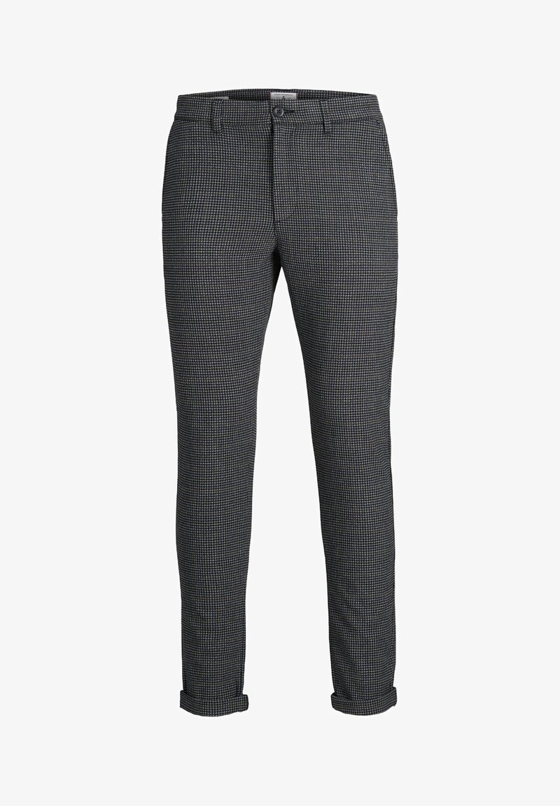 Pantalon ajusté pour homme avec motif à petits carreaux noirs et blancs, fermeture à bouton et ourlets revers.