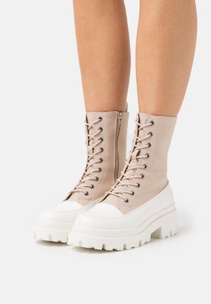 Bottines à plateau - beige