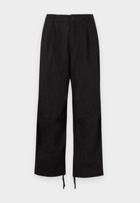 Black wide-leg pants made of textured fabric, featuring a button closure and adjustable ties at the hem for fit customization.