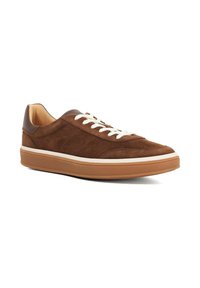 Brown suede sneaker with a rounded toe, contrasting white laces, and a smooth brown leather heel. Features a gum rubber sole and white midsole.
