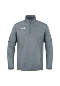 Giacca leggera grigia con zip a un quarto, colletto alto e logo JAKO; presenta accenti arrotondati sulle spalle con punti sulle maniche.