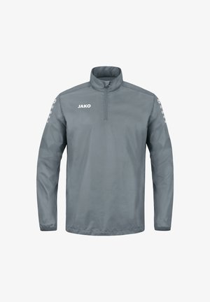 Grijze lichtgewicht jas met een kwart rits, hoge kraag en JAKO-logo; beschikt over afgeronde schouderaccenten met stippen op de mouwen.